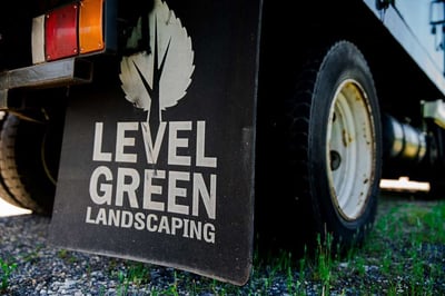 Level Green Landscaping sign on truck