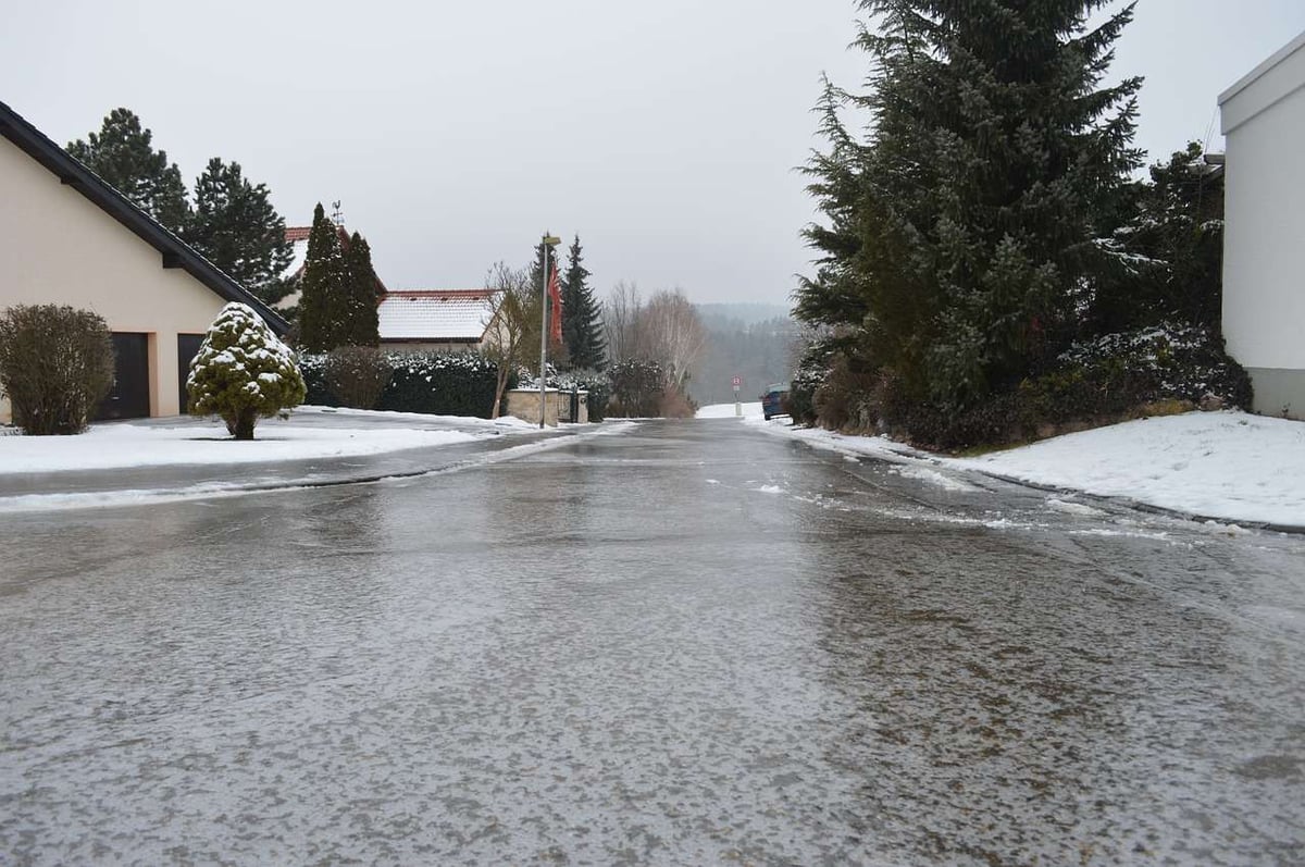 ice covering road at commercial property