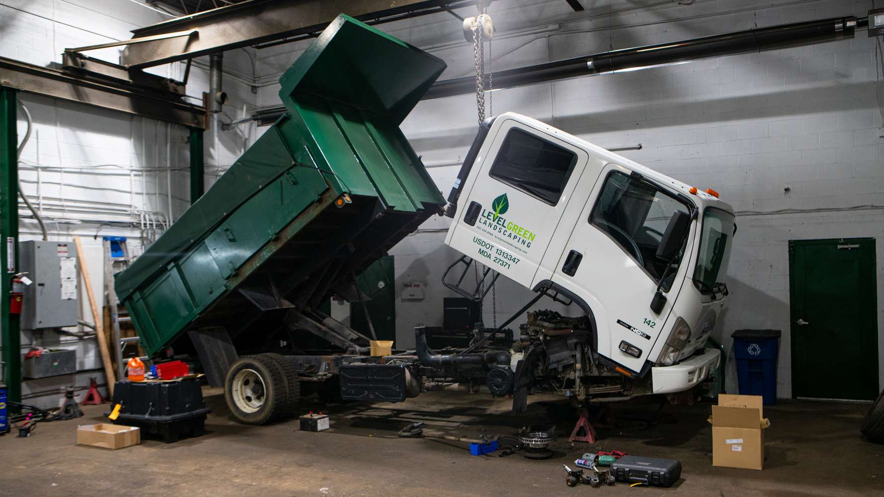 landscaping truck in shop for repair