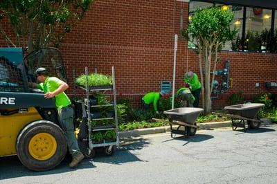 Level Green Landscaping crew members performing job in Maryland