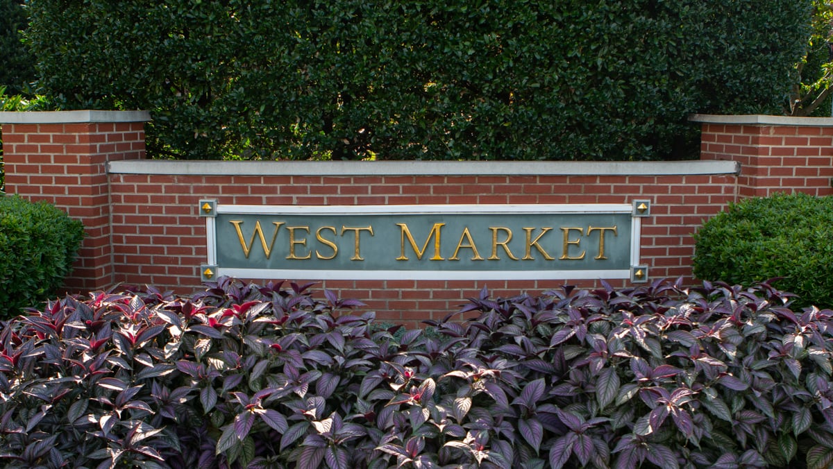 Entrance sign with plants